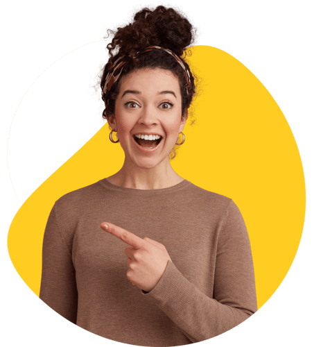 portrait-happy-amazed-young-beautiful-lady-with-curly-dark-hair-heard-cool-news-broadly-smiling-looking-camera-pointing-with-finger-copy-space-isolated-pink-background-(1) (1)